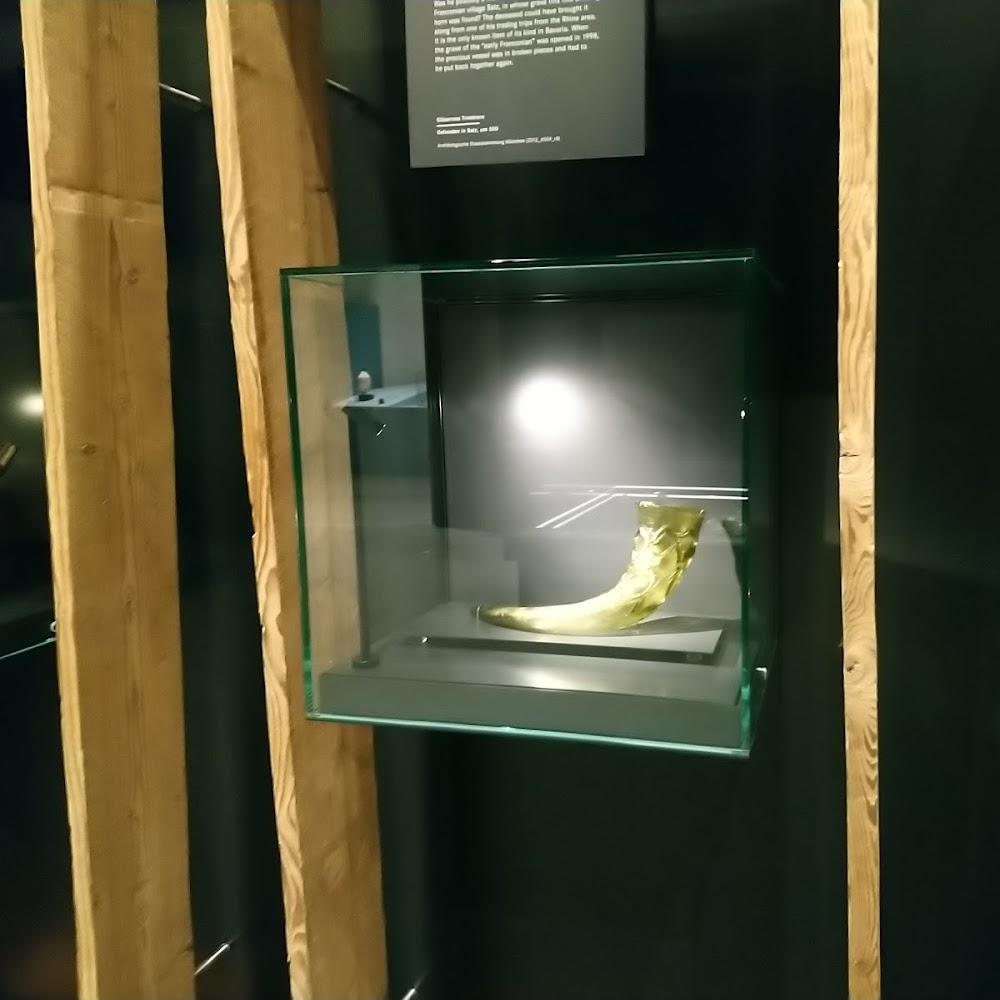 Golden horn on display in a glass case. The Viking Ship Museum.